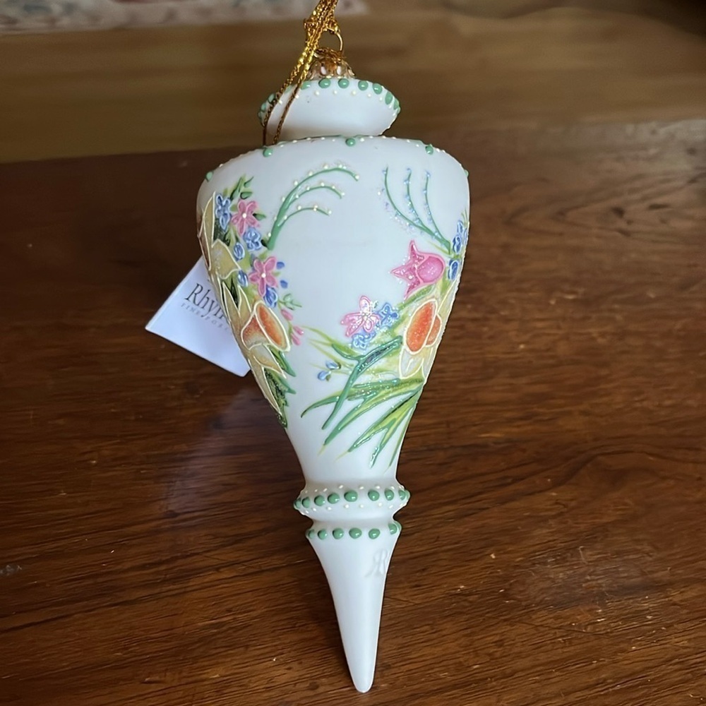 Rhyn-Rivet hand poured bisque porcelain ornament. Painted with daffodils, tulips